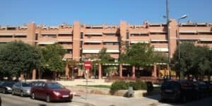 Projecte 1996: Façana residencial de maó, Pl Joan Morral, Sabadell amb terrasses.